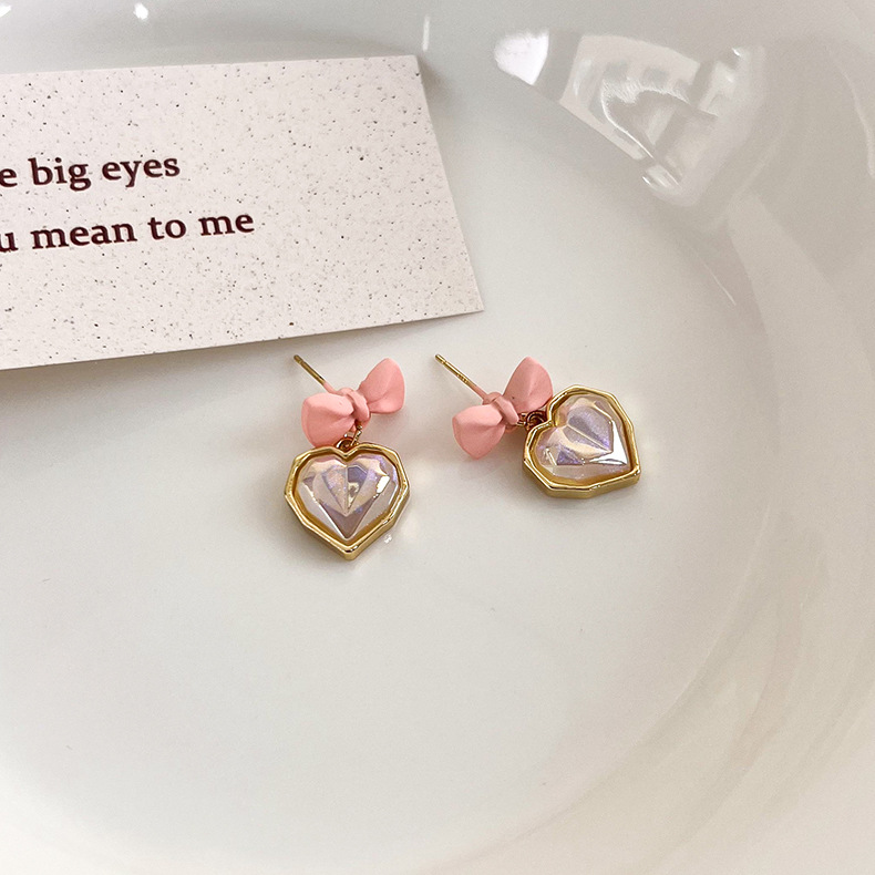 Korean Cherry Blossom Powder Bow Pearl Heart Earrings display picture 2