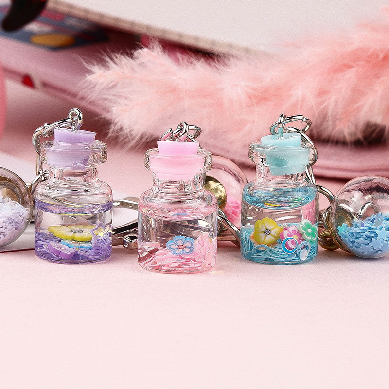 2022 creative keychain girl cute flower quicksand bottle key pendant creative gift student gift