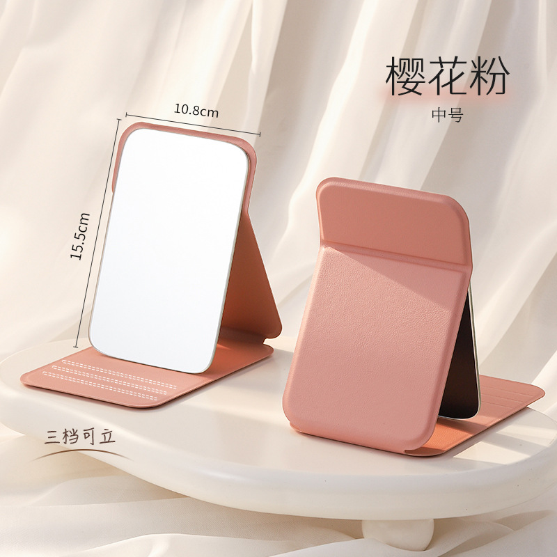 Espejo de maquillaje portátil de viaje de mujer plegable pequeño espejo de mano dormitorio de estudiantes espejo plegable mini espejo para hombre
