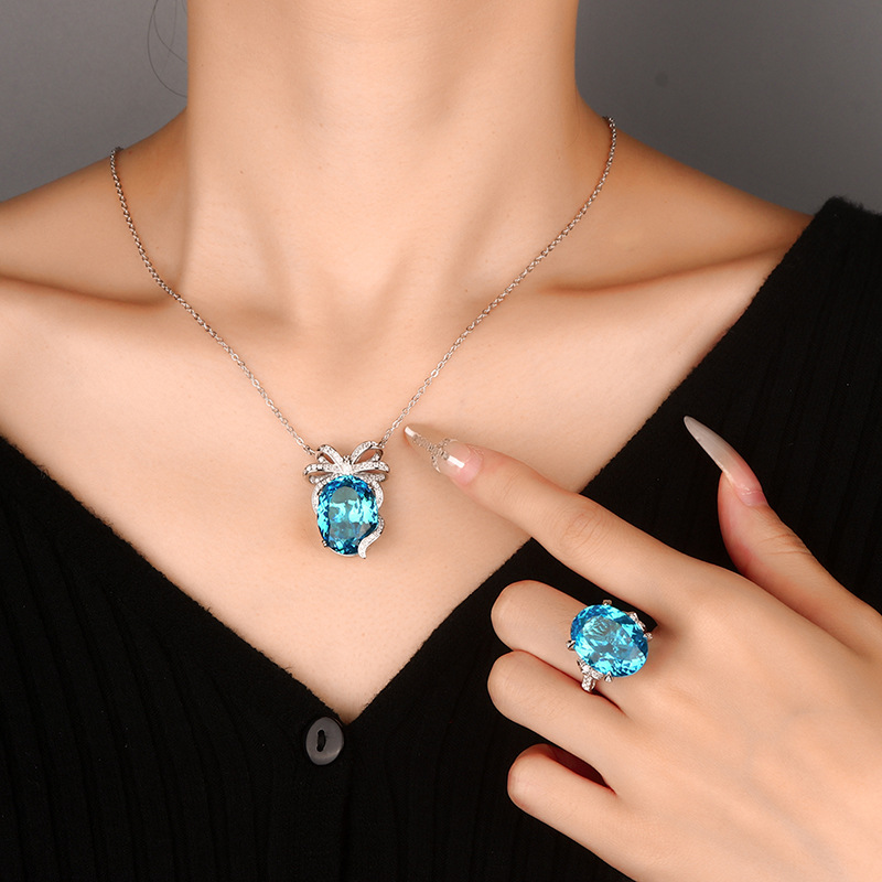 Otoño e invierno nuevo estilo Zhuang Shengsheng joyería simulación nido de pájaro corte de mar azul arco traje de temperamento 15*20