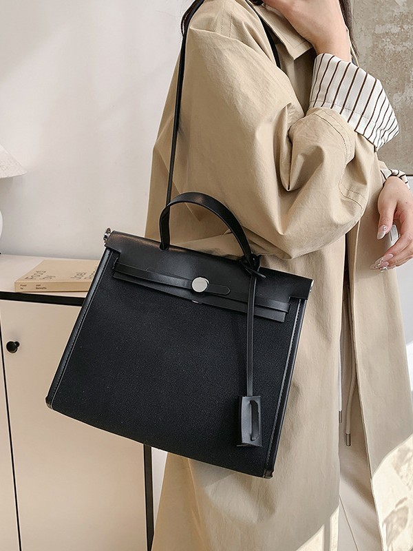 Bolso Carey Tote portátil de alta gama 2025 Nuevo estilo transfronterizo Bolso bandolera de gran capacidad de contraste de lona