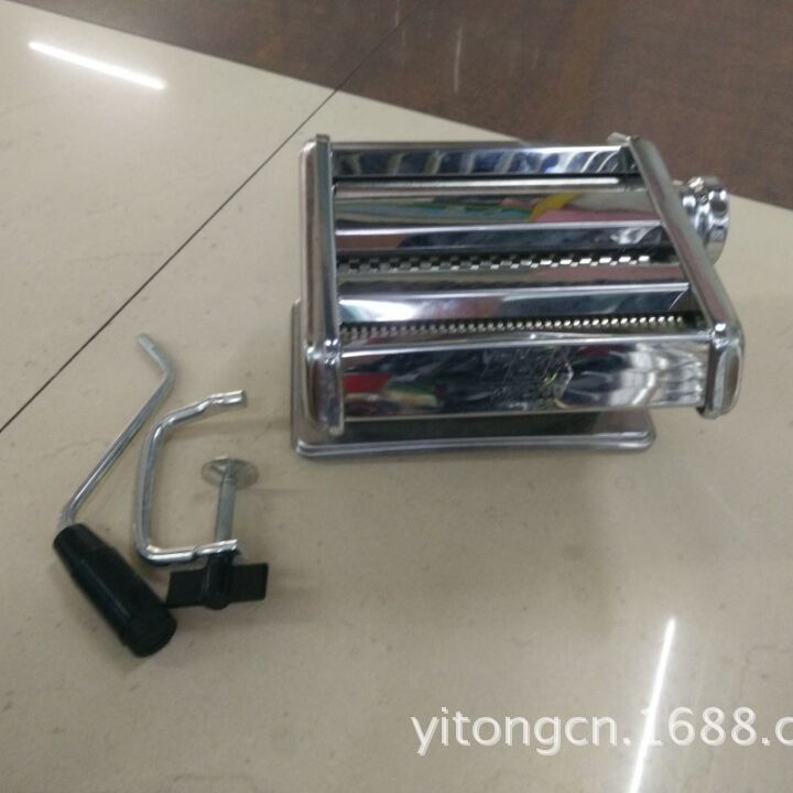 Nuevo modelo transfronterizo, compacto, práctico y elegante, máquina para hacer fideos manual, verde, fácil de operar, volumen de exportación mensual de 2 contenedores de gran volumen.