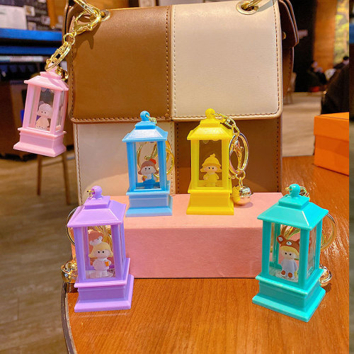 Creative sand bottle flash light keychain pendant cute cartoon small tower lantern night light for students school backpack small ornament wholesale