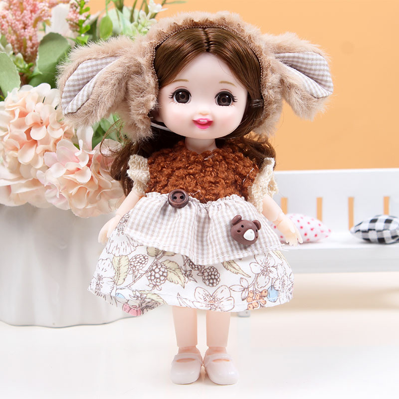 17 cm caja de regalo conjunto de marea constante muñeca Barbie muñeca muñeca cambiante articulaciones muñeca estand móvil