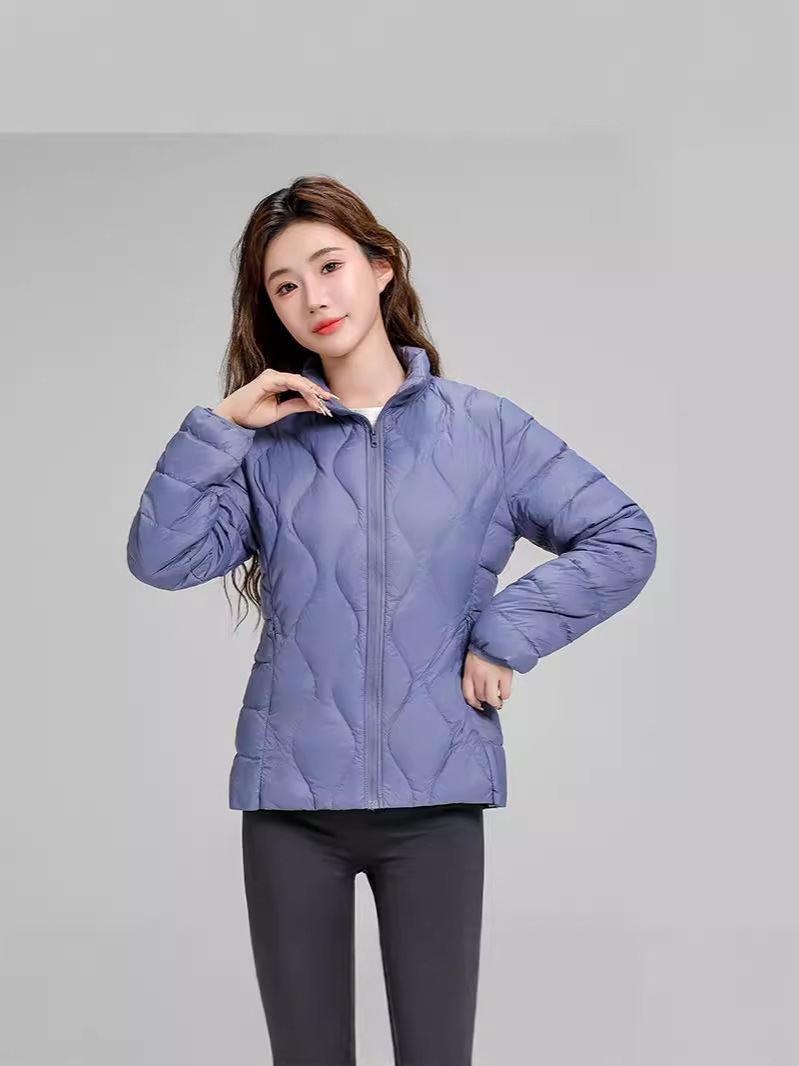 Chaqueta de plumón casual ligera de mujer moda polifacética blanca ligera caliente invierno y otoño abrigo delgado grande