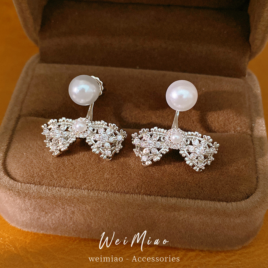 Agujas de plata Zircon arco perlas perlas orejetas coreanas exquisitas cotidianas de viaje versátil pendientes ligeros de lujo alta sensación de orejetas