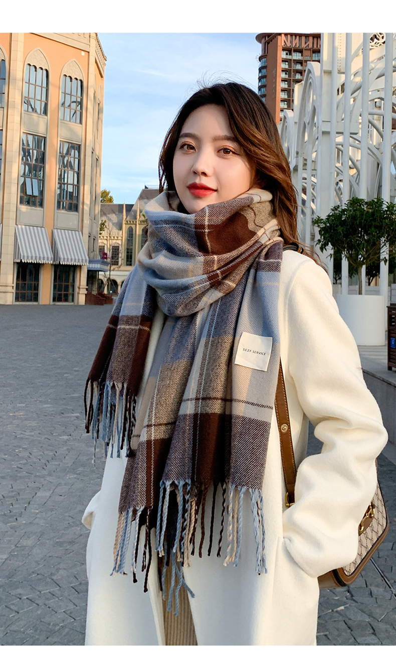 新商品の千鳥格ファッションはカシミヤの女性モデルに似合います。