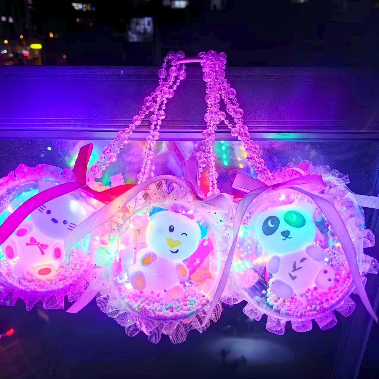 Cadena de cuentas luminosas Linterna de muñeca portátil Bola de cielo estrellado Linterna de animales de dibujos animados coloridos Regalo de juguete luminoso para niños