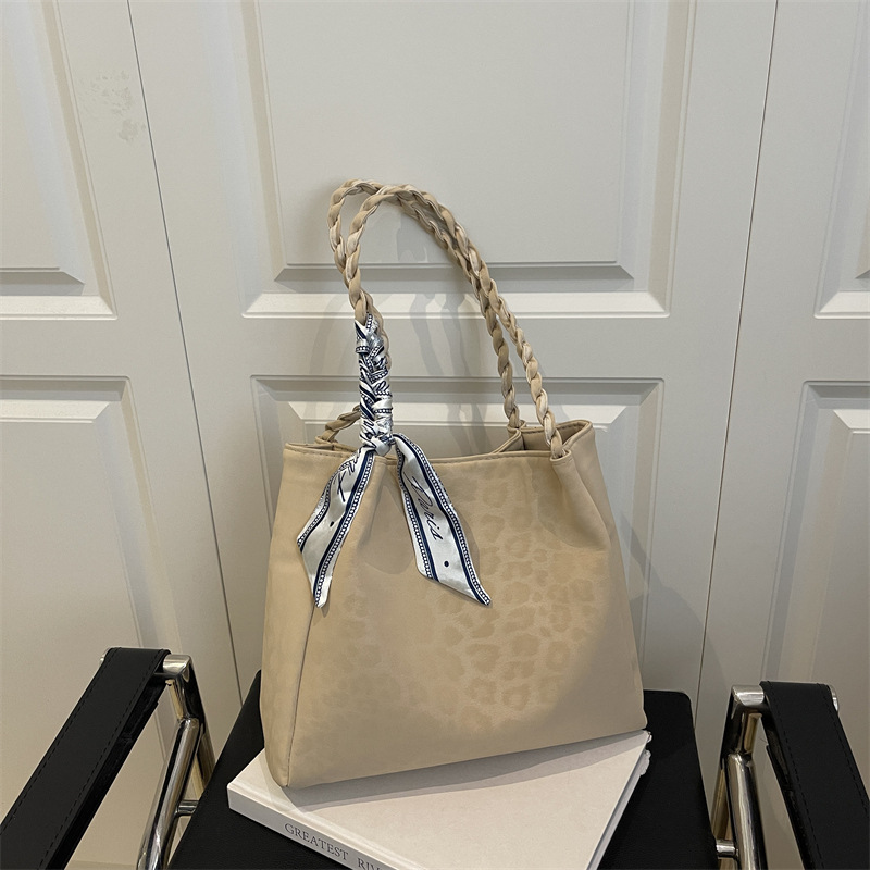 Retro leopardo de gran capacidad bolso tote mujer otoño e invierno 2025 ocio versátil viaje alto sentido de hombro mochila