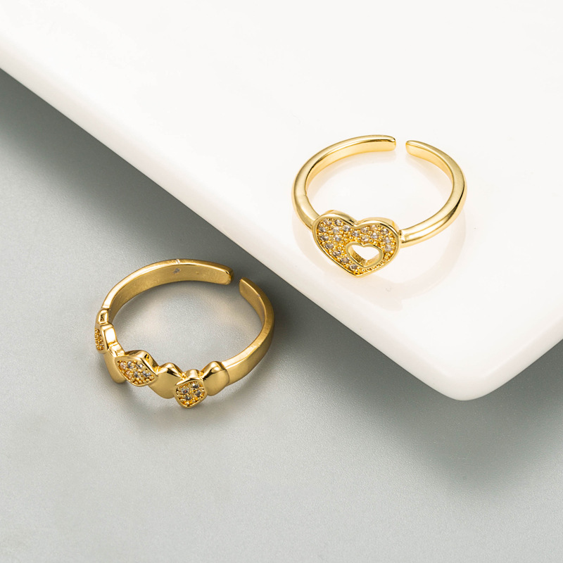 Fashion Hollow Heart-shaped Open Copper Micro-inlaid Zircon Ring display picture 3