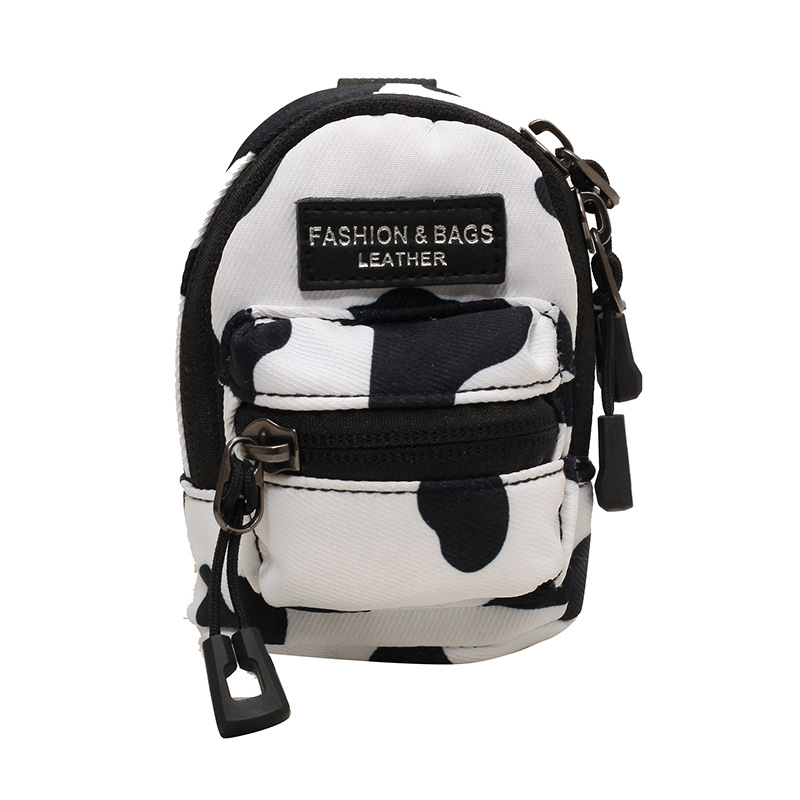 Mini bolso para niños coreano comercio exterior popular leopardo chica mochila de hombro bolso de auriculares de viaje al aire libre bolso de lápiz labial