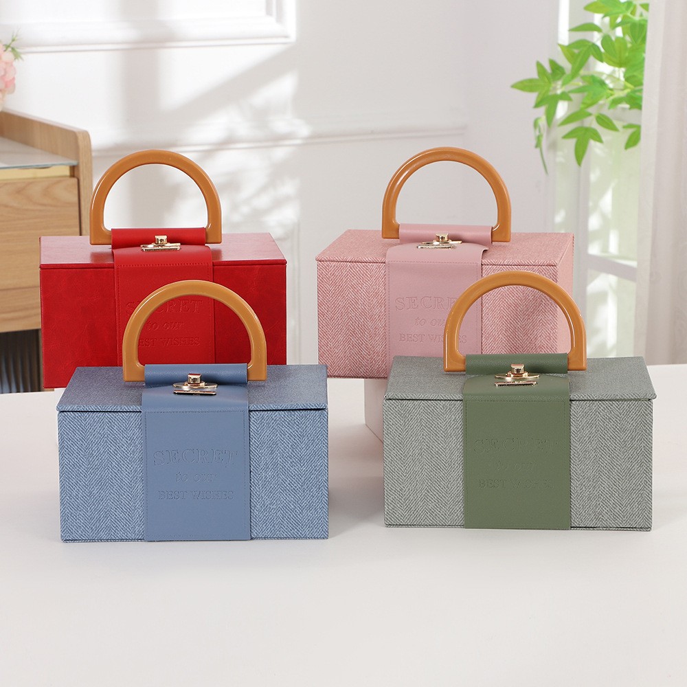 2023 nueva caja de regalo portátil regalo Festival de Primavera caja de embalaje de cuero caja de dulces de boda caja de regalo de mano al por mayor