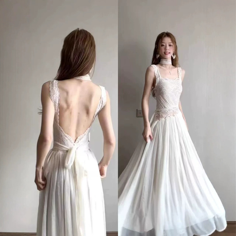 French-Style White Patchwork Lace-Up Backless Lace Dress, a Stunning Long Dress with a Summer Resort Vibe French-Style White Patchwork Lace-Up Backless Lace Dress, a Stunning Long Dress with a Summer Resort Vibe
