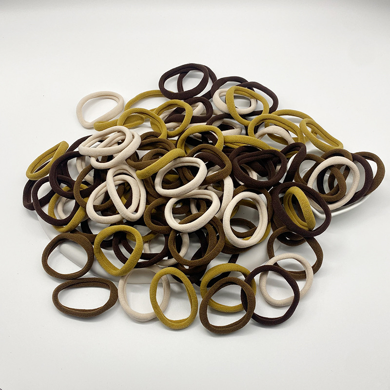 Solo al por mayor cuerda de pelo negro banda de pelo femenino estilo coreano alta elasticidad no duele el pelo banda de goma corbata alta Cola de Caballo accesorios para el cabello del bebé