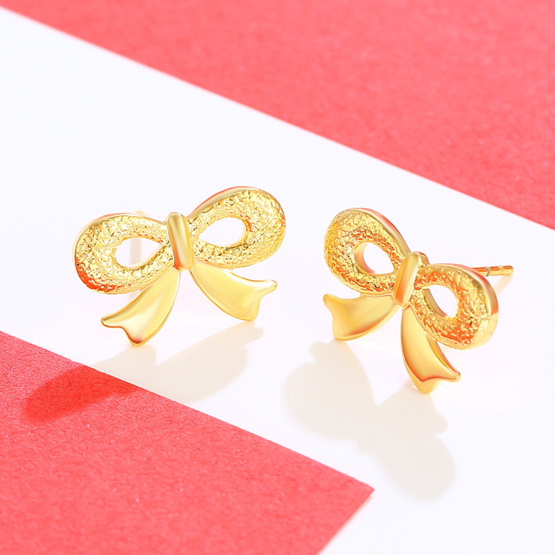 Joyería Xuping arco pernos de orejas imitación de oro encantador temperamento pequeño pendientes femeninos dulces coreanos en forma de corazón