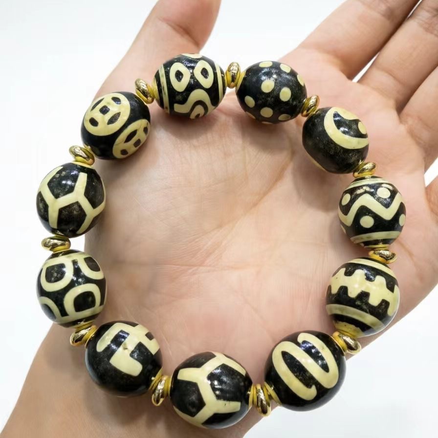 High-value, low-priced, affordable black, white, black, and yellow dzi bead multi-gemstone bracelet with mixed patterns. Live stream special offer for bulk orders.