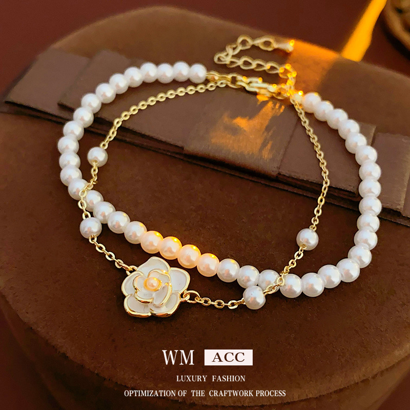 Oro real galvanoplastia gota aceite Camelia perla pulsera elegante luz de lujo de alto grado pendientes de fábrica al por mayor