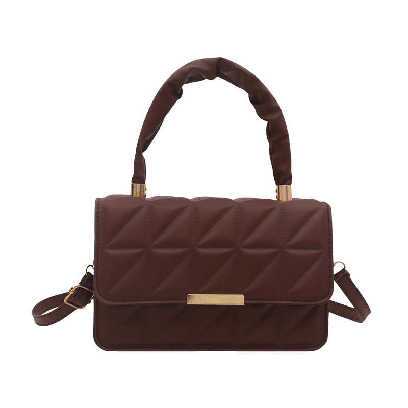 Minimalista bolso de viaje de viento 2024 engolpeado diamante otoño nuevo diseño de bolso de hombro simple estilo bolso de mochila