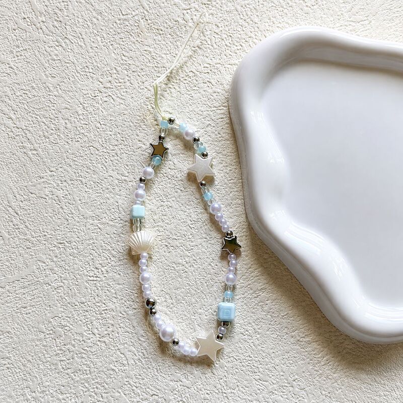 Fresh blue and white pearl shell star phone chain, versatile handmade beaded wrist strap accessory, factory wholesale Fresh blue and white pearl shell star phone chain, versatile handmade beaded wrist strap accessory, factory wholesale