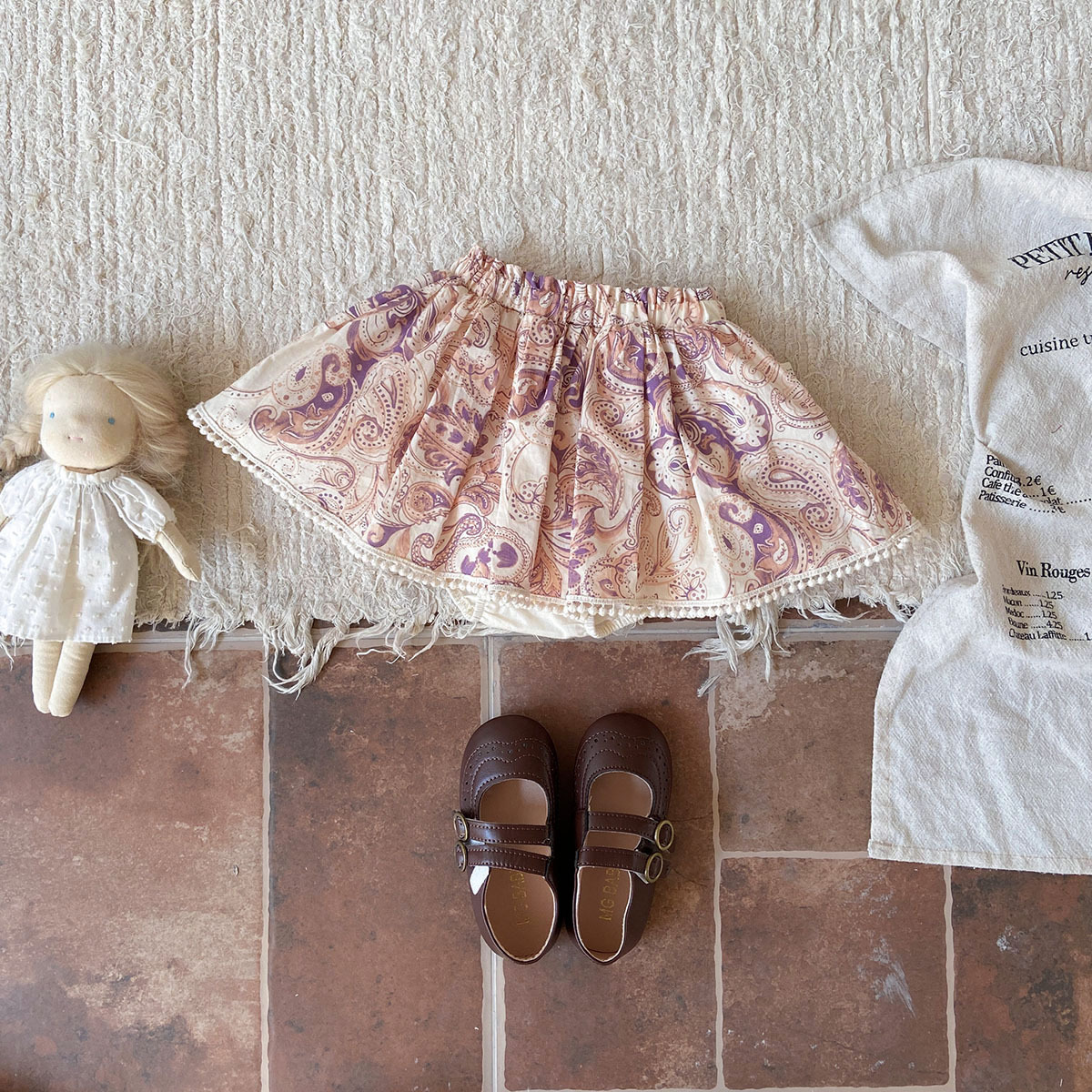 Traje coreano para niñas 2025 nuevo verano niña sin mangas chaleco jacquard bolso falda de culo traje de dos piezas