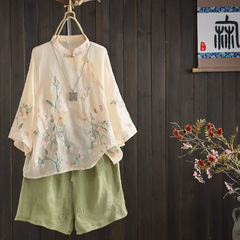 レトロな刺繍の綿麻のシャツの大きいサイズの婦人服の文芸の新しい中国式の立襟の5分の袖の斜めの襟は気質の上着を掛けます