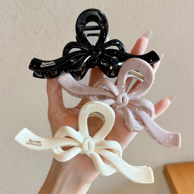 Temperamento arco flotante clip para el cabello de mujer cantidad de diseño de clip de tiburón tarjeta de cabello detrás de la cabeza agarrar clip para el cabello