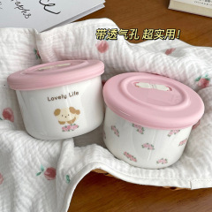 子犬のかわいい赤ちゃんの陶磁器のサプリメントの碗は蓋の排気穴があって密封して新鮮な碗の小さい弁当箱が蒸れることができます。