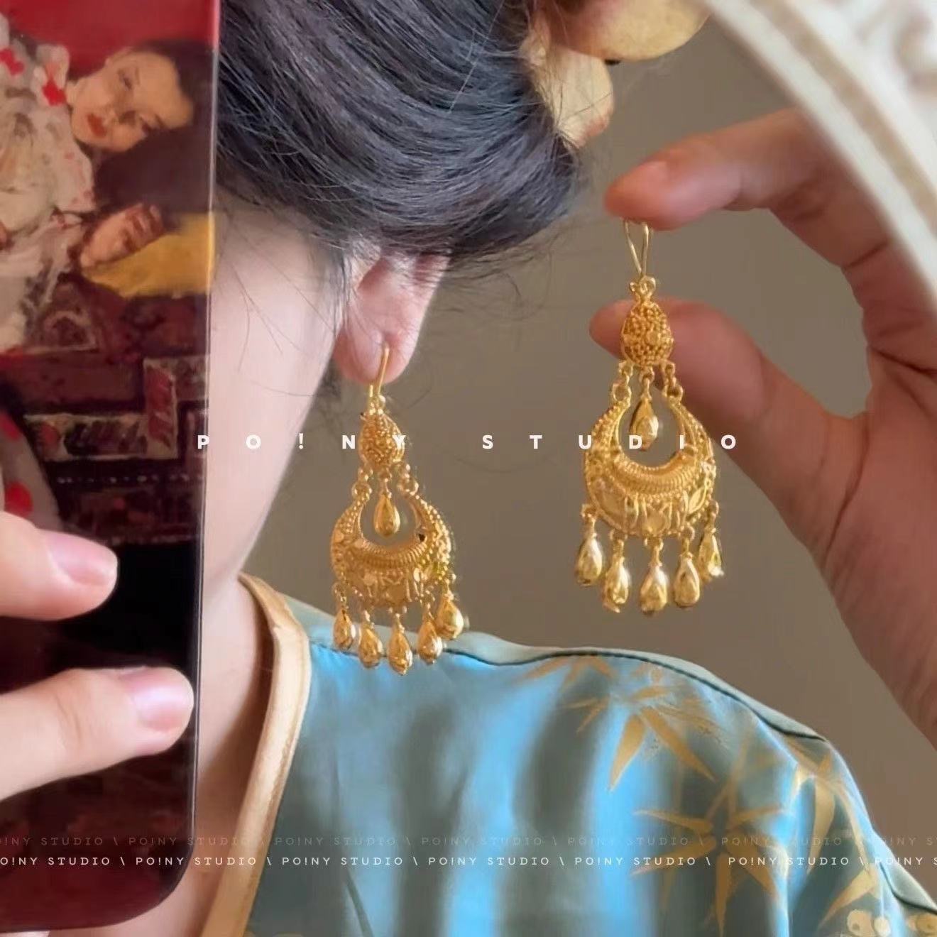 Retro Ethnic Style Golden Water Drop Tassel Long Earrings High-End Niche Design Accessible Luxury Cut Out Miaojiang Earrings