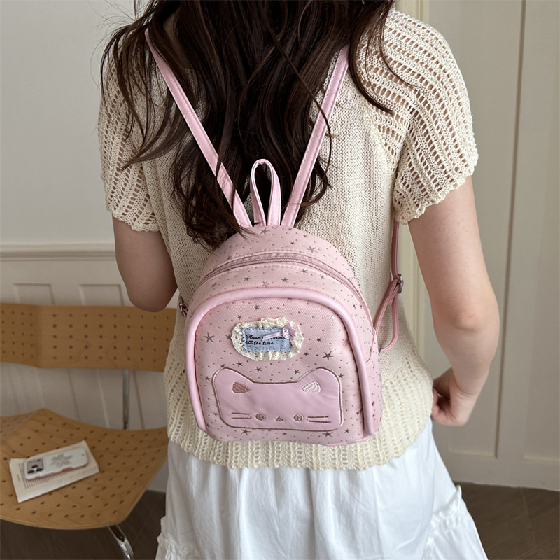 2026 nueva universidad estampada estrella mini mochila de estudiantes niña caricatura gato mochila pequeña
