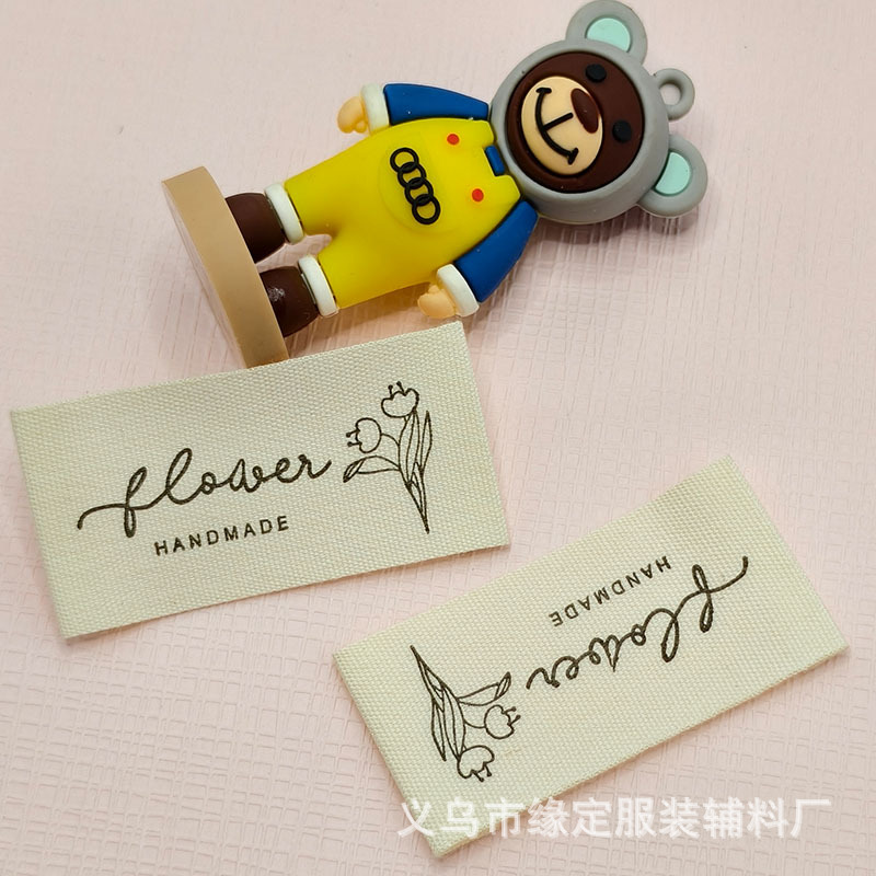 现货棉带郁金香水洗标厂家直供服装鞋帽袜子侧标洗水标来图定制