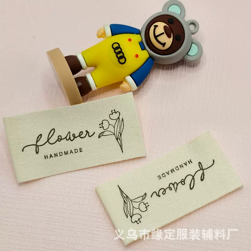 现货棉带郁金香水洗标厂家直供服装鞋帽袜子侧标洗水标来图定制