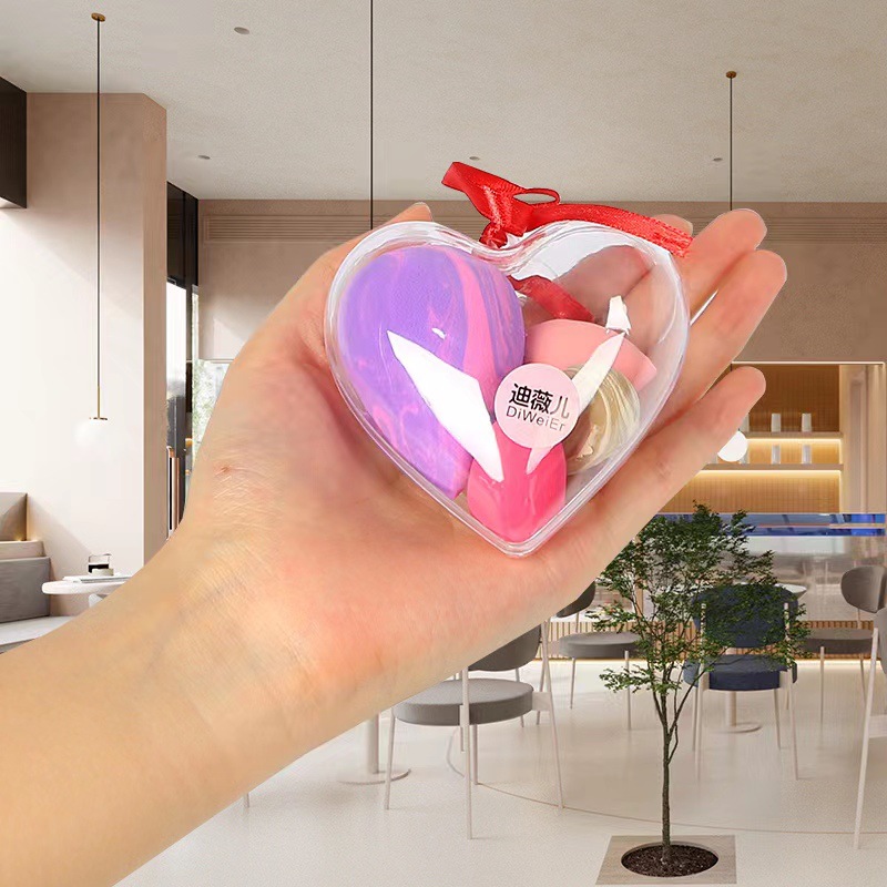 El amor de los huevos de maquillaje no comer polvo, polvo seco y húmedo, maquillaje con un pequeño conjunto de polvo de maquillaje de huevos de color al por mayor.