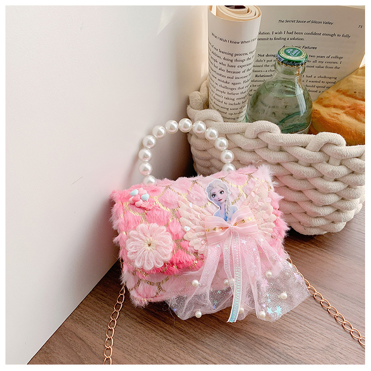 Bolsas de niños transfronterizas otoño y invierno nuevos lindos bolsos de peluche de perlas mini princesa bolsos de cadena de colores