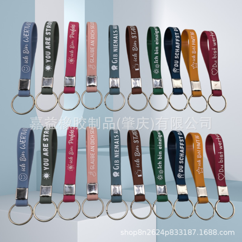 Cross-Border Hot-Selling In-Stock Items: 10 Types of German Motivational Quotes Silicone Keychains and Inspirational Silicone Bracelets for Young Students