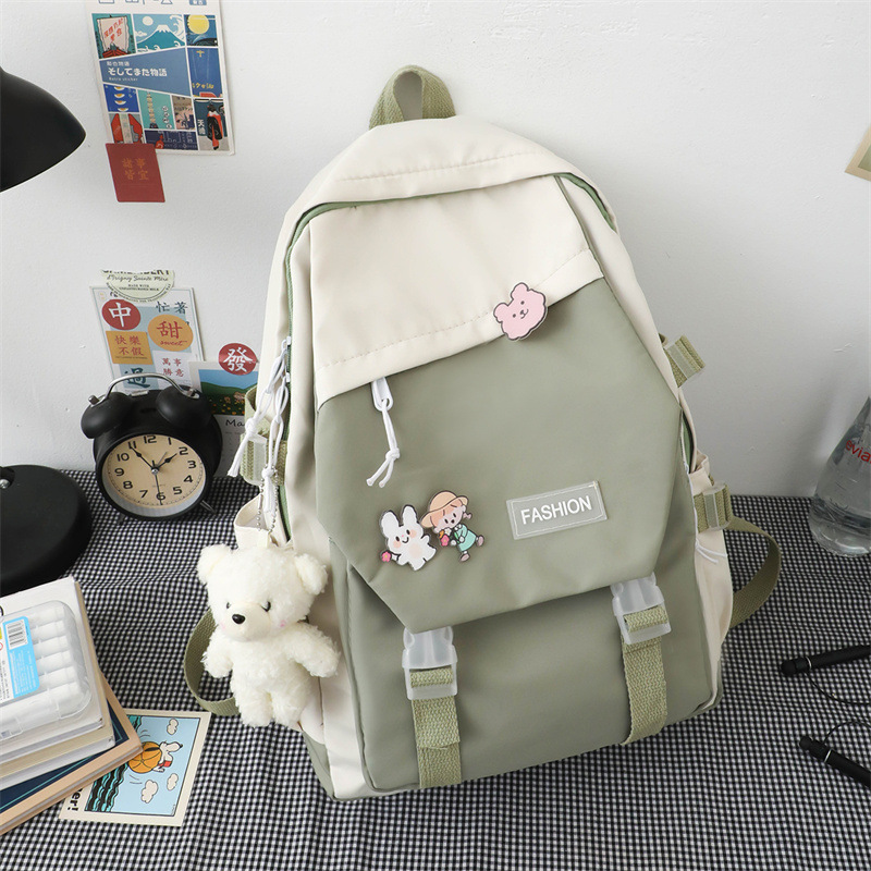 Colores contrastantes universales estudiantes japoneses mochila escolar de gran capacidad universitaria mochila de ocio de viento herramientas mochila de hombro al por mayor