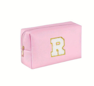 Amazon Venta caliente bolsa de cosméticos simple Pu Cruz patrón impermeable carta inicial bordado bolsa de cosméticos bolsa de almacenamiento de cosméticos