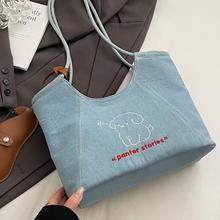 卡通牛仔帆布包包女2025新款潮时尚韩国托特包百搭大容量腋下包潮