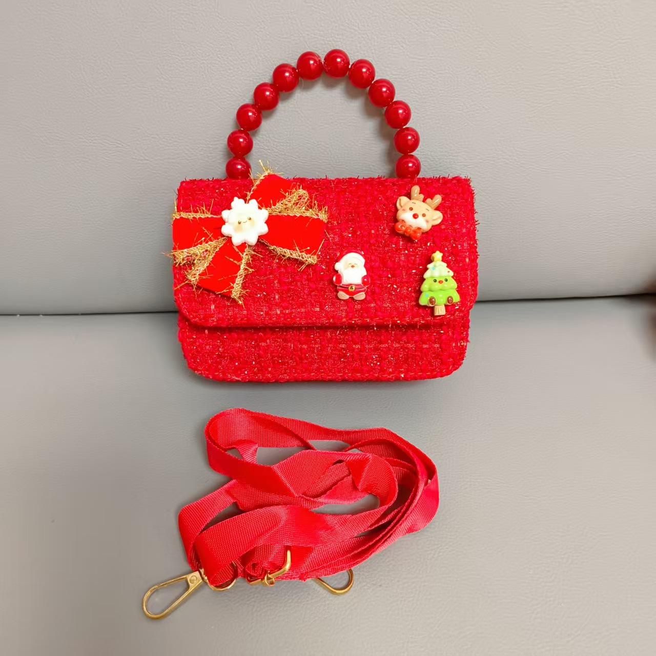 Cartera de Año Nuevo rojo arco de papá Noel bolso de perla pequeña cadena de viento fragante bolso de hombro