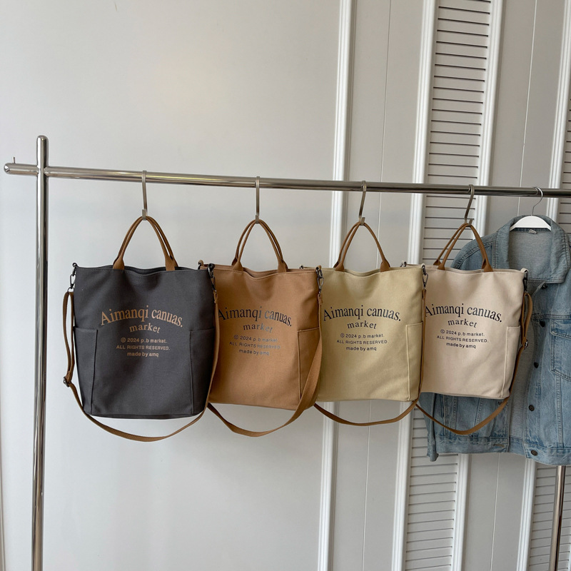 时尚印花字母大容量水桶包百搭夏季新款个性休闲厚实斜跨单肩包包