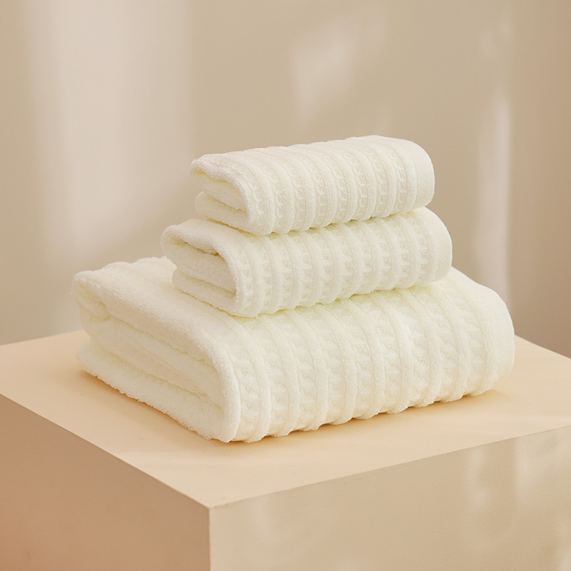 Toalla de algodón al por mayor toalla de baño que no es fácil de perder el cabello 2025 nuevo estilo liso, toalla de tira suave, toalla facial