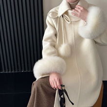 狐狸毛翻卷立领插肩袖飘带毛球一粒扣中长款双面尼羊毛大衣女毛呢