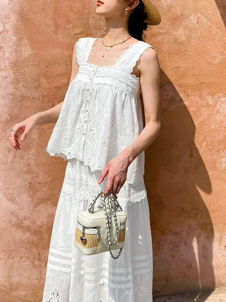 Boxifeng chaleco blanco top falda traje mujeres vacaciones francesas top hueco Shenzhen Nanyou ropa de mujer verano