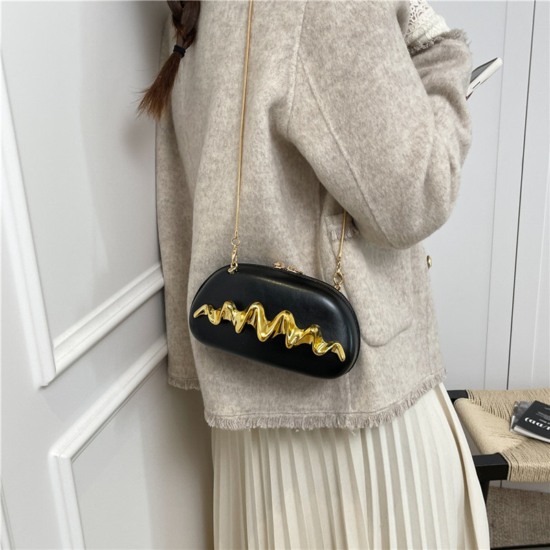 Bolso de mano de moda europea y americana personalidad para mujeres 2025 nueva cadena de moda bolso de cena bolso de hombro bolso de caja diagonal