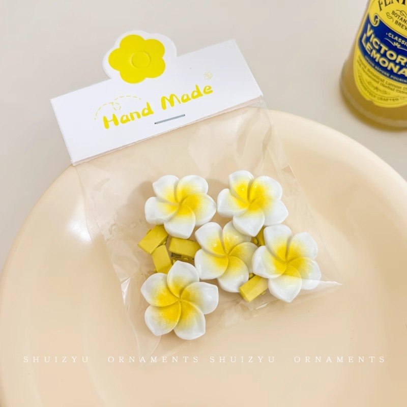 Huevo flor clip para el cabello de cabeza de mujer frente clip para el cabello de flores fotos junto al mar borde del cabello frangeo lateral clip para la boca