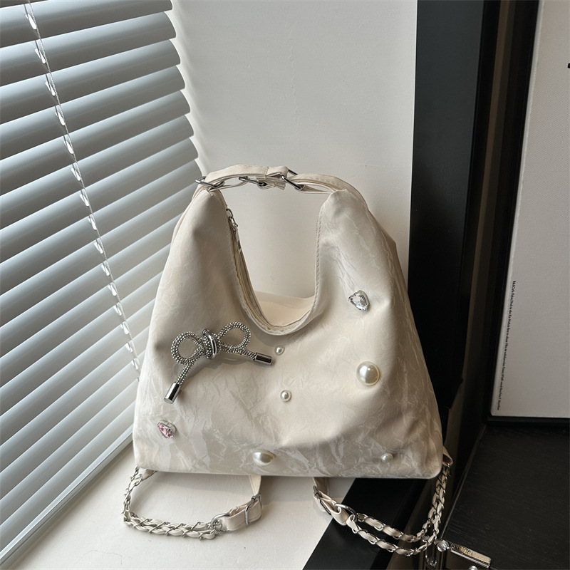 Mochila de diseño de nicho, mochila de hombro, mochila multipropósito, bolsas de cadena de alta capacidad.