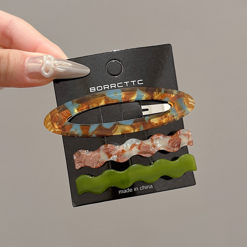 Clip de cabello de flor de leopardo para mujeres clip de cabello de alto nivel frente clip de frangeo 2025 nuevo clip lateral clip de cabello toque