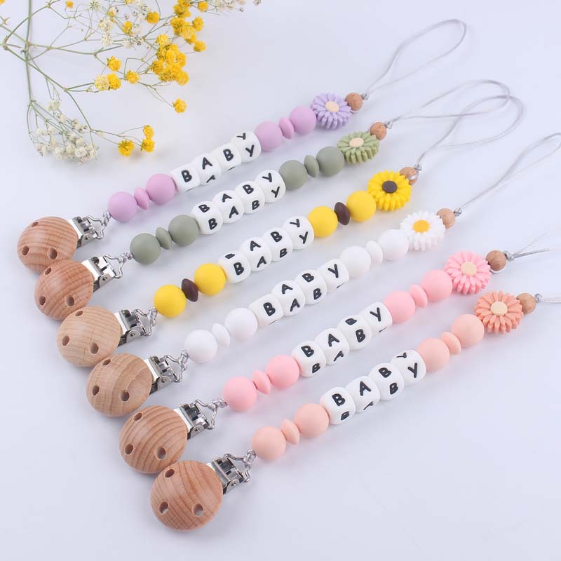 Nuevo bebé suministros de dibujos animados Margarita silicona mordedor creativo DIY nombre mordedura pegamento molar pezón cadena