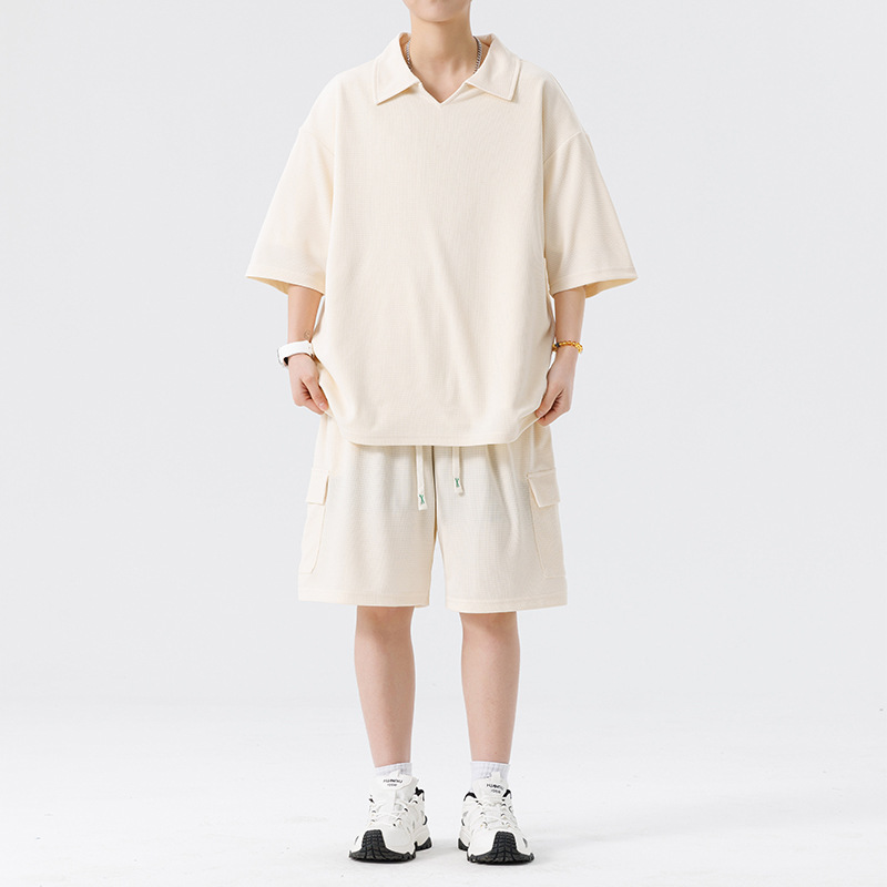 Nuevo traje deportivo suelto con solapa para hombre, pantalones cortos de manga corta para hombre de moda juvenil, traje de dos piezas casual y simple