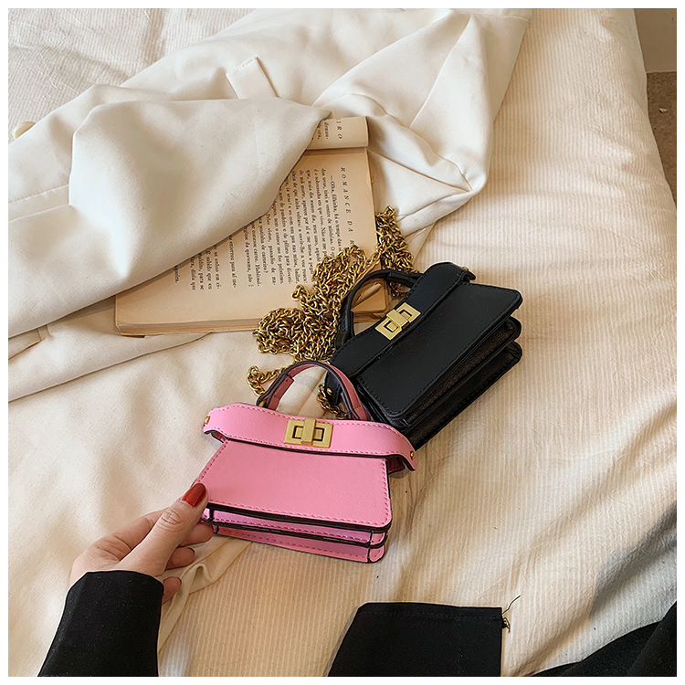 Nuovo stile di sfilata di celebrità di Internet di nicchia Stile di celebrità Stesso stile Borsa per rossetto con catena diagonale a mano con lucchetto a doppia faccia_voghion.com