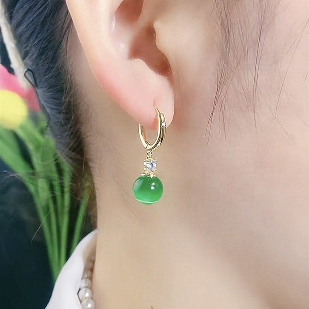 Retro estilo de Hong Kong ópalo redondo s925 con pendientes de plata, pendientes de temperamento simple de lujo ligero femenino, orejas de sentido avanzado de nicho